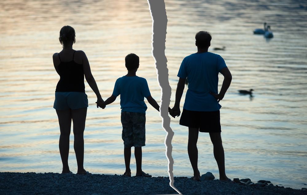 Family holding hands with tear down image, like a picture, illustrating the concept of a family split/divorce due to addiction.